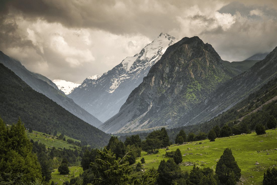 Snow on the peaks above the valley
